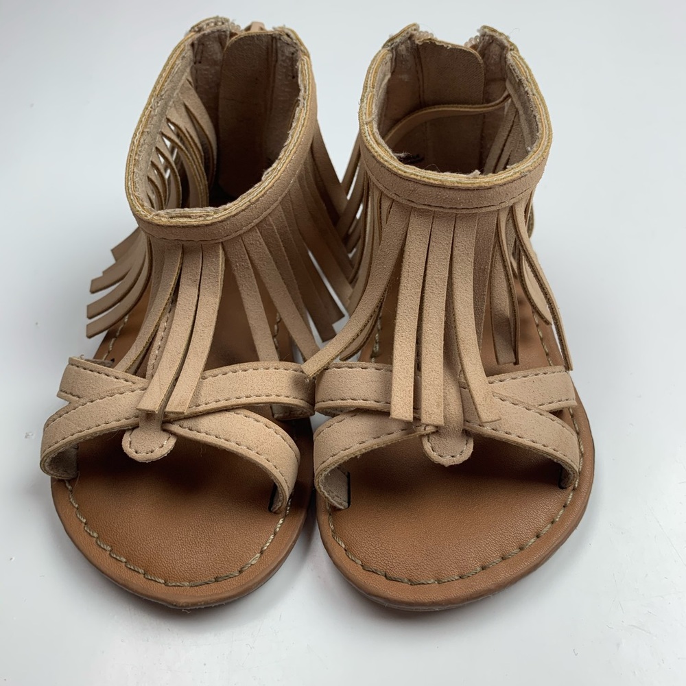 Gap sandals with fringes.